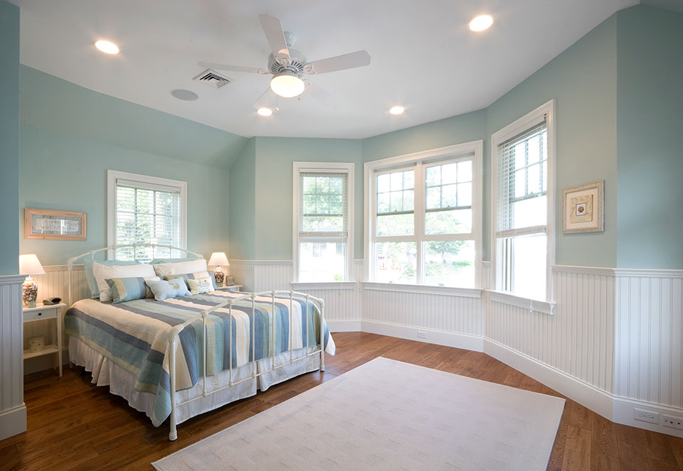 Clean Cottage Bedroom with cool blue walls