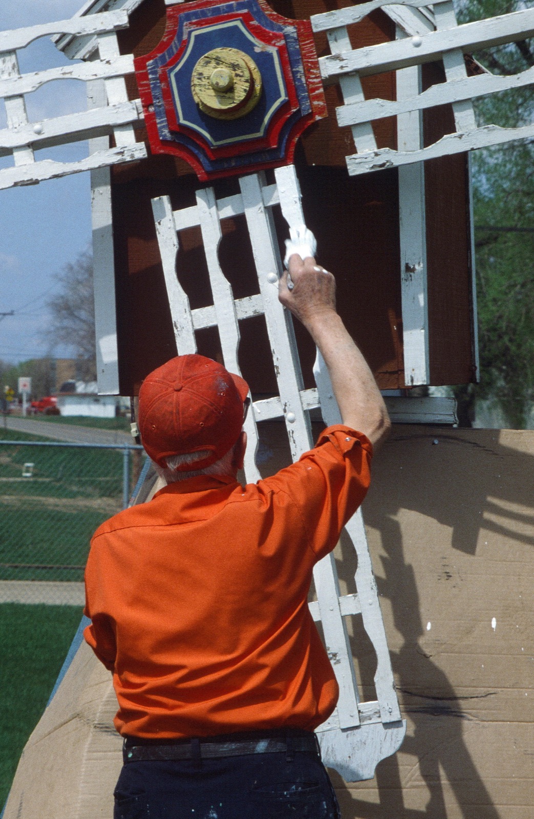 Andrew painting a smaller windmill