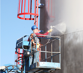 Worker Spraying Paint